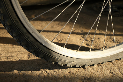 Close up shot of a bicycle locked on the parking spot at the street of Frankfurt.