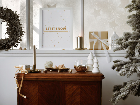 Christmas composition on the vintage shelf in the living room interior with mock up poster frame, beautiful decoration, big window, christmas tree, candles, stars, gifts, light and elegant accessories. Template.
