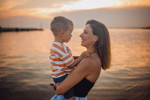 istock Woman with son on vacation 1676132725