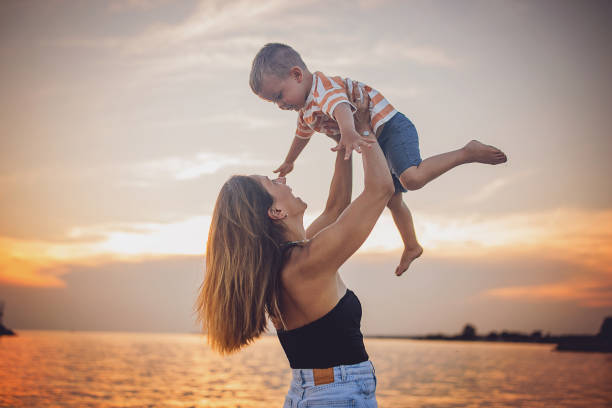 istock Mother enjoying with son on vacation 1676140387