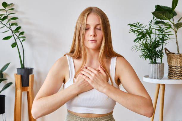 istock Fit woman doing yoga plank and watching online tutorials on laptop, training in living room. Sport and recreation concept 1676151766
