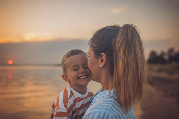 istock Woman with son on vacation 1676173466