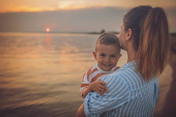 istock Woman with son on vacation 1676176311