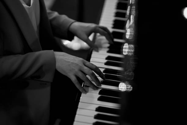 istock Female pianist plays the royal piano. 1676206827