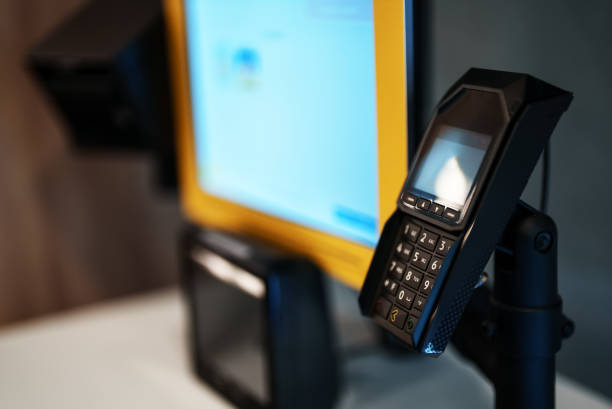 Self-service cash register with payment terminal.