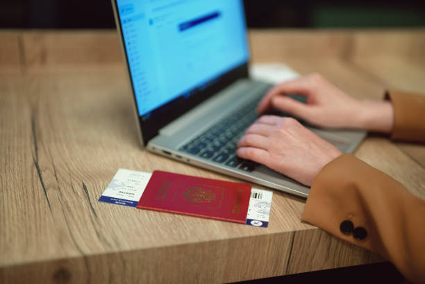 istock Woman with russian passport is waiting for her flight. 1676212723