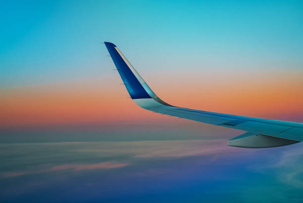istock Wing of an airplane, view from window. 1676213254