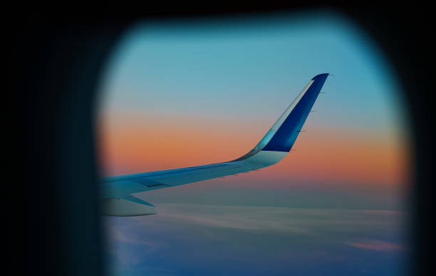 istock Wing of an airplane, view from window. 1676213259