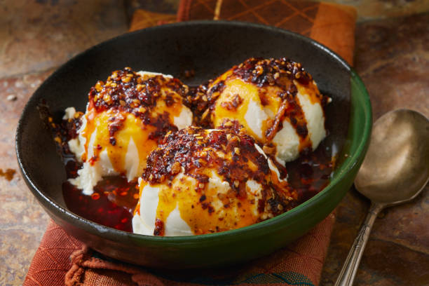 istock Copycat Spicy Chili Crunch Vanilla Ice Cream 1676217216