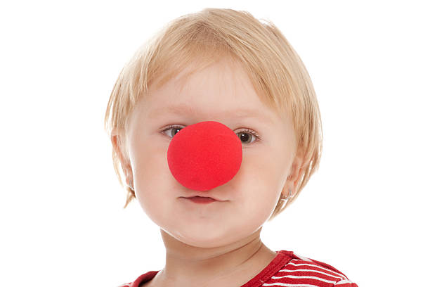 istock child with clown nose 167621888