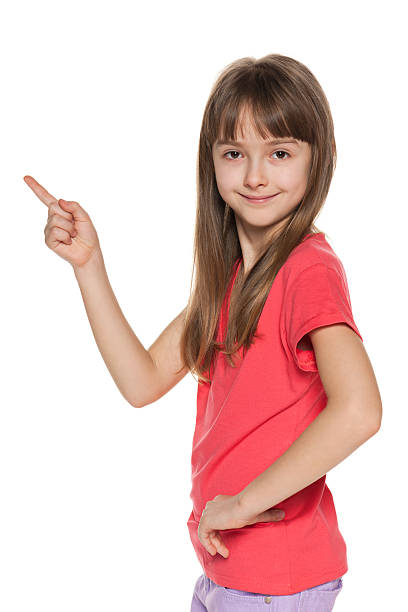 istock Young girl shows her finger to the side 167623568