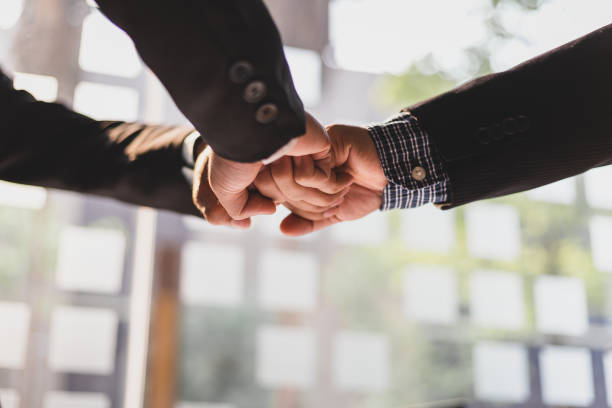 istock Collaboration and unity of people in an organization. 1676243106