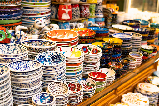 Traditional colorful ceramic plates and souvenirs. Turkish gift shop.
