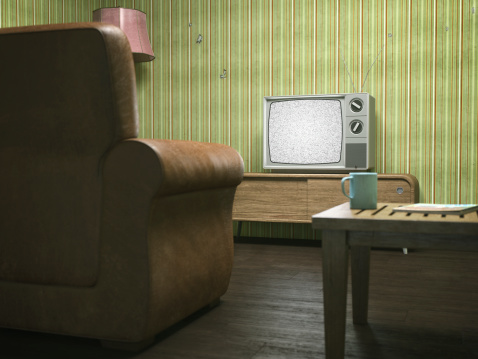 Vintage television in retro living room.