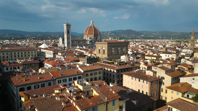 Aerial view of Piazza del Duomo in Florence, Aerial view of Firenze old town and Piazza del Duomo in Florence, Historically and Culturally Rich Italian Town Florence, Firenze - Aerial view of the city of Florence, Popular tourist destination in the world