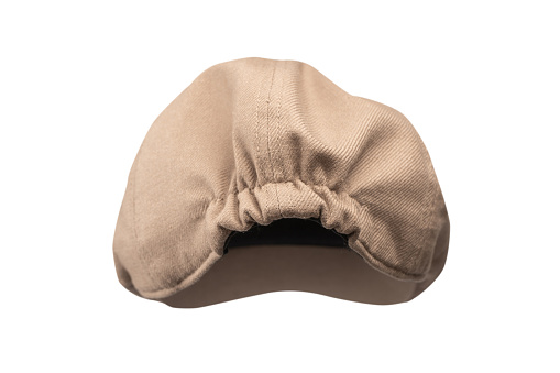 Light brown ascot cap isolated on a white background.