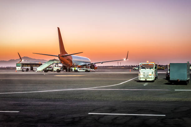 istock Airplane during maintenance against sunrise or sunset 1676328021