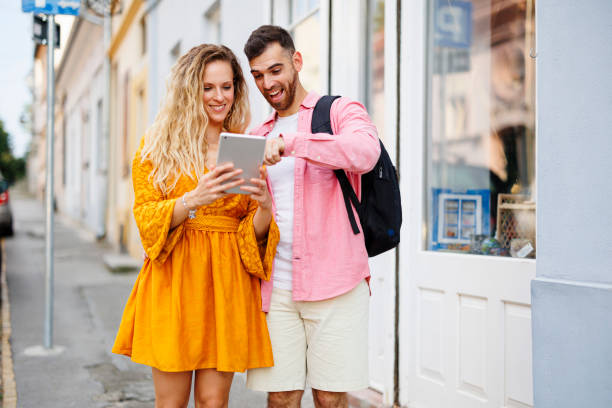 istock Young couple tourist exploring new city 1676330289