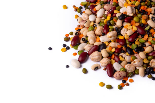 istock Mixed dried legumes and cereals isolated on white background 1676332520