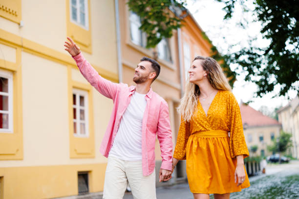 istock Young couple tourist exploring new city 1676333579