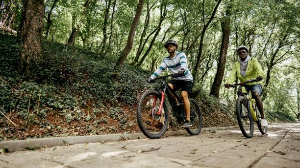 istock Male friends riding mountain bikes 1676348737