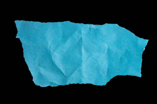 검은색 배경에 분리된 찢어진 파란색 종이 조각 - paper crumpled document letter 뉴스 사진 이미지