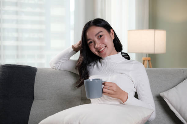 istock young attractive asian woman relaxing 1676371621