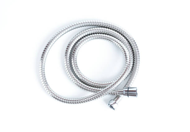 Twisted hose for mixer on a white background. View from above
