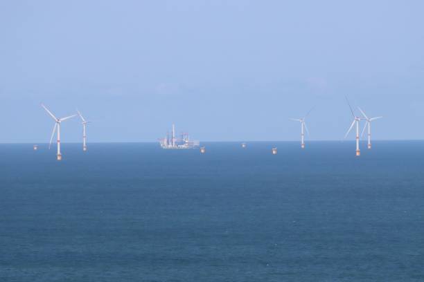 Wind turbines sea park stock photo