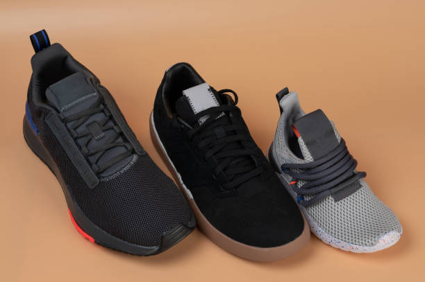 istock Line of sport shoes different size 1676386783