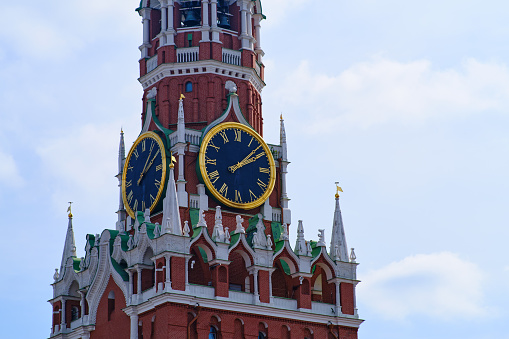 Spasskaya tower of the Moscow Kremlin on a background of blue sky