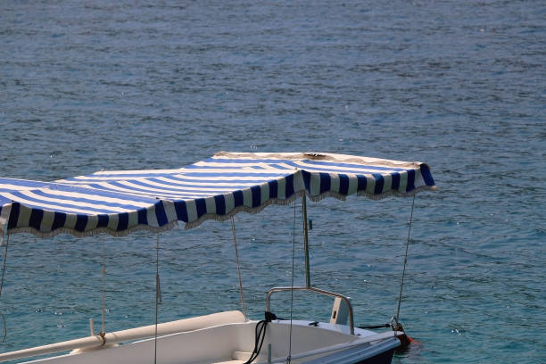 istock Picturesque Boat on the Promenade 1676410983