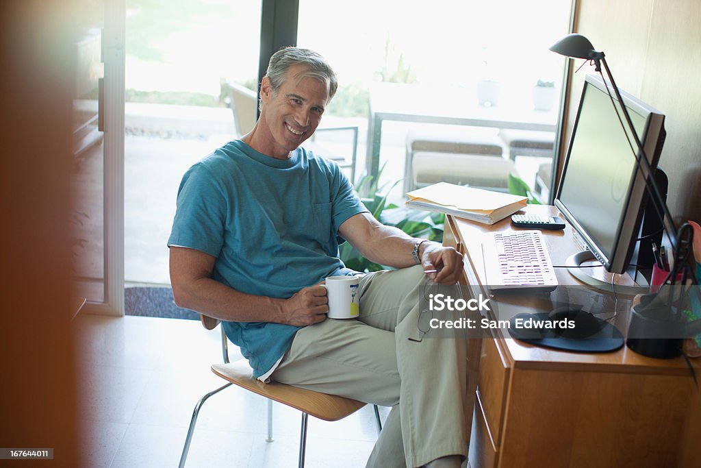 Older Man Using Computer Older Man Using Computer Indoors Stock Photo - Download Image Now - 50 ...