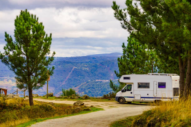 istock Rv camper camping on nature 1676441384