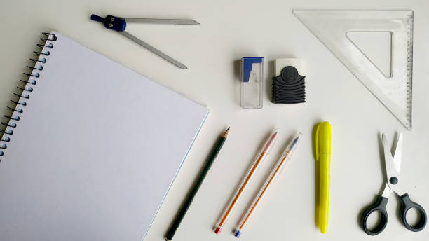 istock Composition of School Supplies Items on a Simple White Background. 1676464044