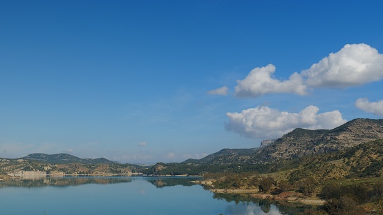 Spanish nature landscape. Lake Embalse del Guadalhorce and surrounding countryside, Ardales Reservoir, Malaga Andalucia, Spain.