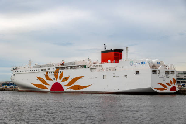 Osaka, Japan - September 2, 2023 : Sunflower Kurenai is a liquefied natural gas (LNG)-fuelled ferry that serves the Osaka-Beppu route between Sunflower Ferry Terminal and Beppu International Tourist Port in Japan.