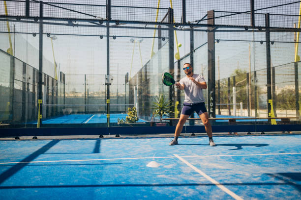 istock A man plays paddle tennis, a sport that combines physical activity with fun. It is a great sport for players of all age groups and skills 1676473815