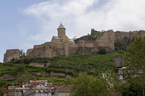 Tbilisi, Georgia - April 27, 2022: Narikala is an ancient fortress overlooking Tbilisi, the capital of Georgia, and the Mtkvari River.