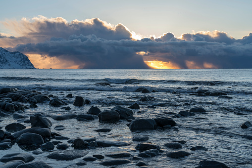 Stones in the sea at Utakleiv beach, winter, Steinsfjorden. Vestvagoya-Nordland fylke-Norway.