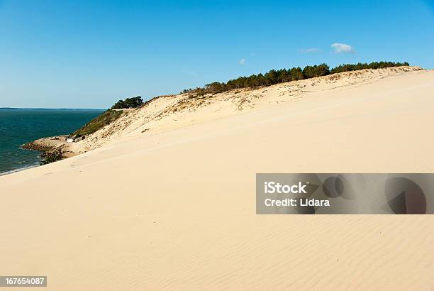 Los Grandes Dunas De Pyla Foto de stock y más banco de imágenes de Agua - Agua, Aire libre, Amarillo - Color