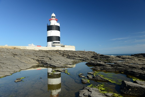 Itapua lighthouse (farol da Ponta de Itapuã) also known as Northern Guardian of Todos os Santos Bay in Salvador, Brazil.