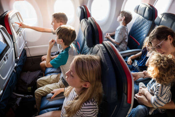 Family Traveling on Airplane Together