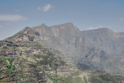 Landscape view of the secluded Simien Mountains National Park in Northern Ethiopia, Africa in a cloudy haze.