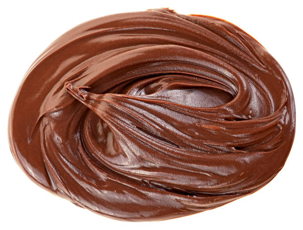 istock Swirl from hazelnut cream isolated on a white background, top view. Cream chocolate spreading. 1676574765