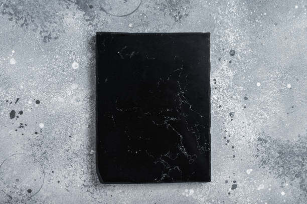 istock Cooking background with old empty marble board. Gray background. Top view. Copy space 1676626611