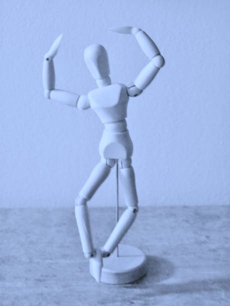 istock Wooden figure moves 1676639695