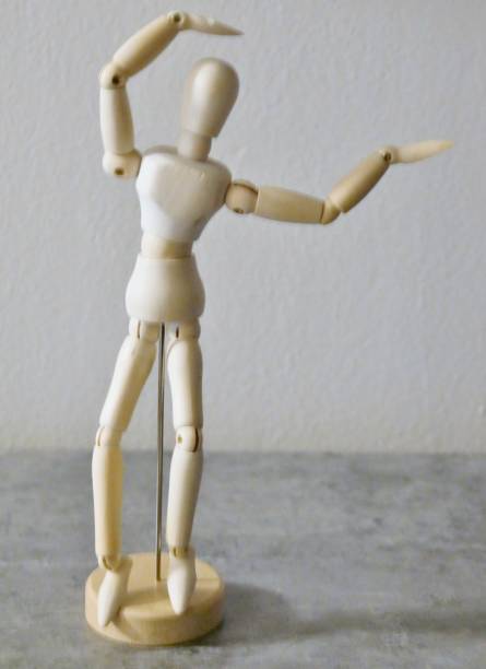 istock Wooden figure moves 1676639699