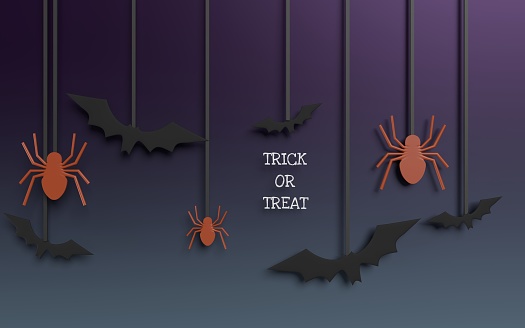Trick or treat written by hanging letters and flying bats and flying spiders over purple and blue background. Horizontal composition with copy space. Halloween concept.