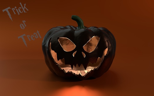 Written trick or treat text and illuminated Jack O' Lantern glowing on orange background copy space, Halloween concept.